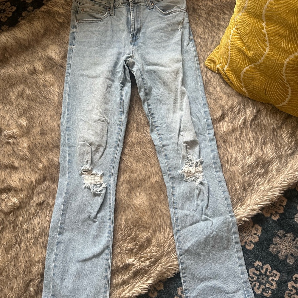 Women's Light Blue Distressed Jeans